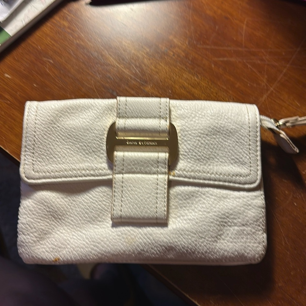 White clutch with gold detail